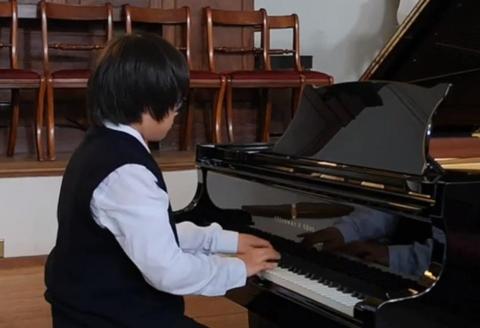 Young pianist of St. Giles
