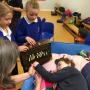 Children from a mainstream primary school making music with disabled children at a nearby SEN school as part of the Hands up for Singing project